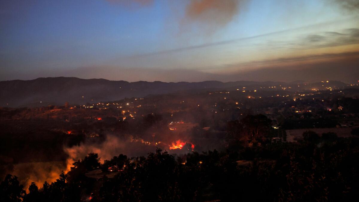 The Thomas Fire continues to burn, creating a plume of smoke over Ojai.