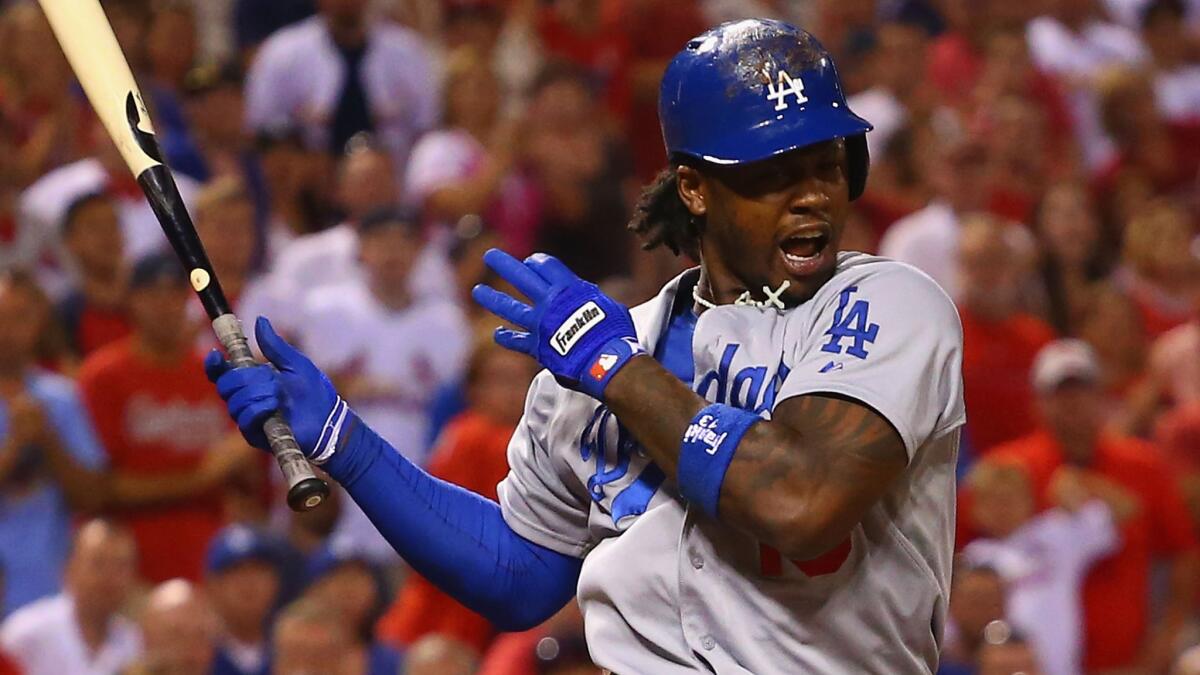 Dodgers shortstop Hanley Ramirez reacts after being struck on his left hand with a pitch against the St. Louis Cardinals on Sunday.