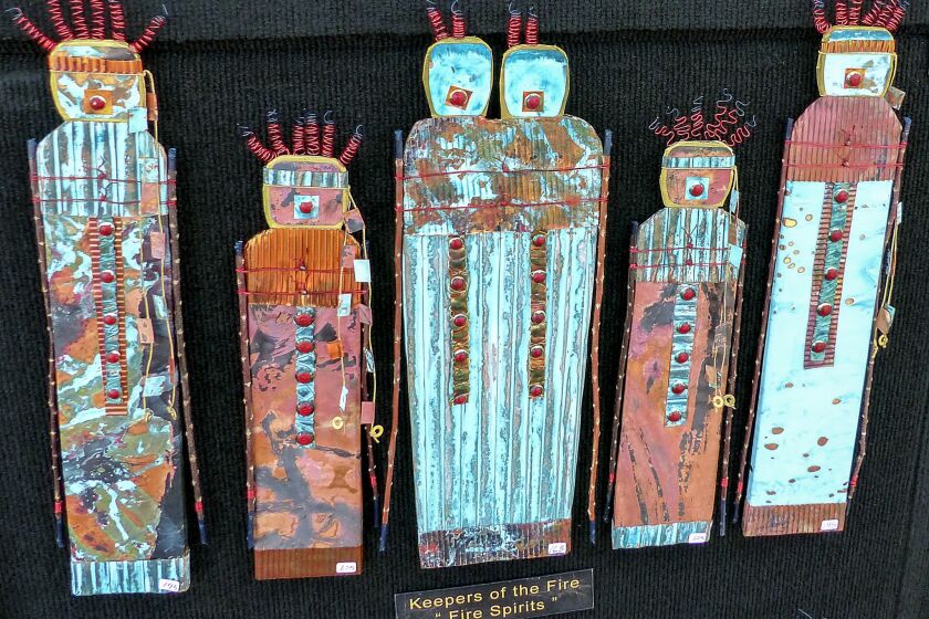 Southwestern symbols inspire the artwork on display at one of the booths at the Thunderbird Artists Art and Wine Festival, held several times each winter in Carefree.
