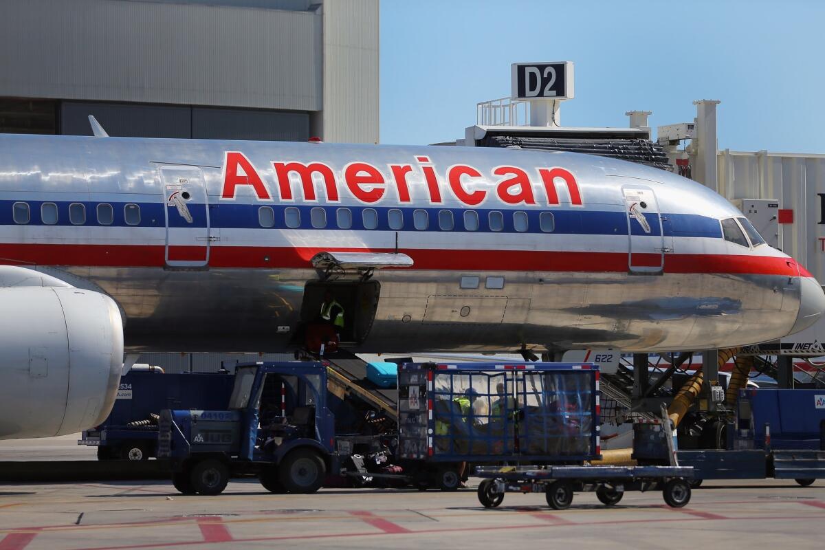 Thomas Horton, who led American and its parent company, AMR Corp., since 2011, gave up the post of chief executive to Doug Parker, the former chief executive at US Airways. Horton will serve as chairman of the board of the new American Airlines Group Inc.