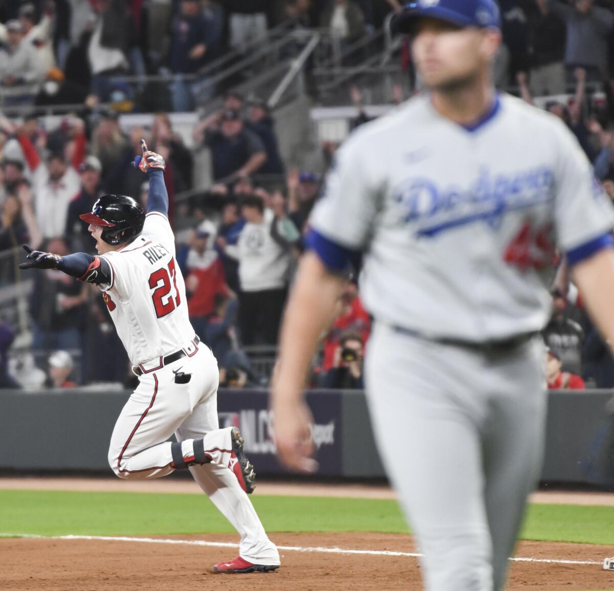 Atlanta's Austin Riley celebrates after hitting a walk-off RBI single off Dodgers pitcher Blake Treinen