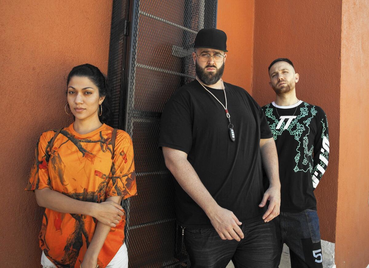 Asma Maroof, left, one-half of the experimental production duo Nguzunguzu, with Fade to Mind co-founders Will Boston, center, and Ezra Rubin. “Our brand’s really complicated,” Rubin says.