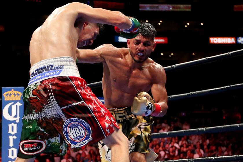 Abner Mares, right, fights Leo Santa Cruz on Aug. 29, 2015.