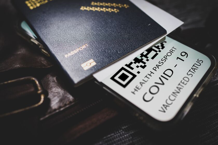 Covid-19 passport with QR code on smartphone