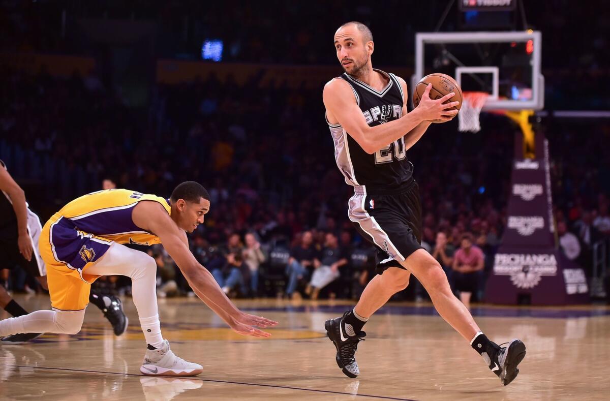 In this file photo taken on November 18, 2016 Manu Ginobili looks to pass getting away from Jordan Clarkson of the Los Angeles Lakers in Los Angeles, California during the NBA basketball matchup. - Argentina's Manu Ginobili will have his number 20 jersey retired by the NBA's San Antonio Spurs in a ceremony at a March 28 home game against Cleveland, the team announced on October 30, 2018. Ginobili won four NBA titles in 16 NBA seasons with the Spurs with a career .721 win percentage, his 762-295 record the best in NBA history among players with at least 1,000 league appearances.