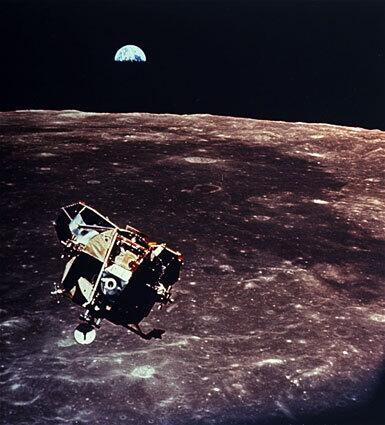 With the Earth rising above the moon's horizon, the lunar module moves toward a rendezvous with the command module after blasting off from the surface. Michael Collins, who piloted the command module, was born in Italy and is a graduate of the U.S. Military Academy at West Point, N.Y.