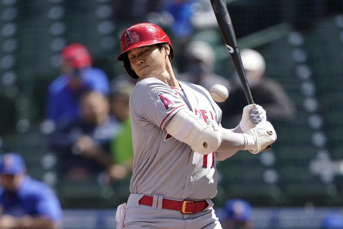 Angels batter Shohei Ohtani is hit by a pitch during the fifth inning of a 2-0 loss to the Seattle Mariners.
