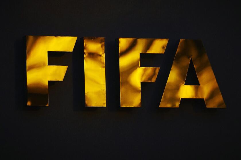 A FIFA logo stands outside the world soccer body's headquarters in Zurich, Switzerland on June 2.
