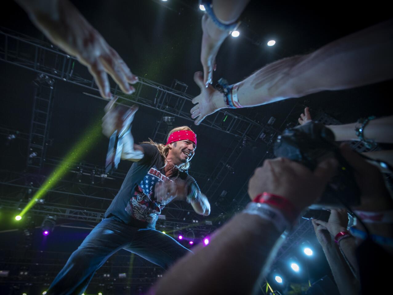 Rocker Bret Michaels greets fans as he performs on the Palomino Stage on the first day of the three-day 2019 Stagecoach Country Music Festival.