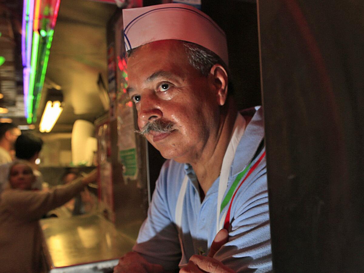 Tomas Martinez, owner of Tacos Tumbras A Tomas in the Grand Central Market in Los Angeles