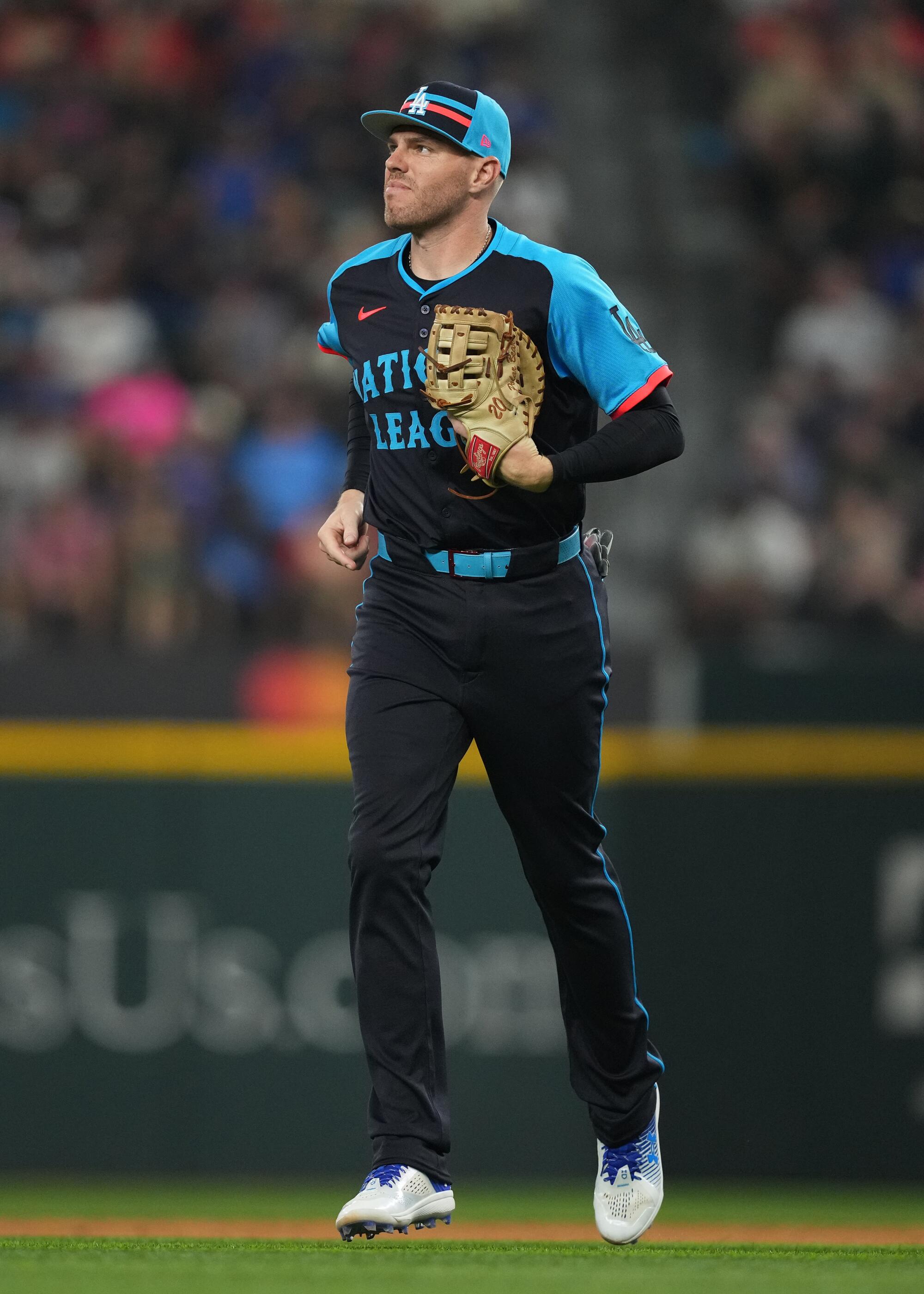 Freddie Freeman walks back to the dugout.