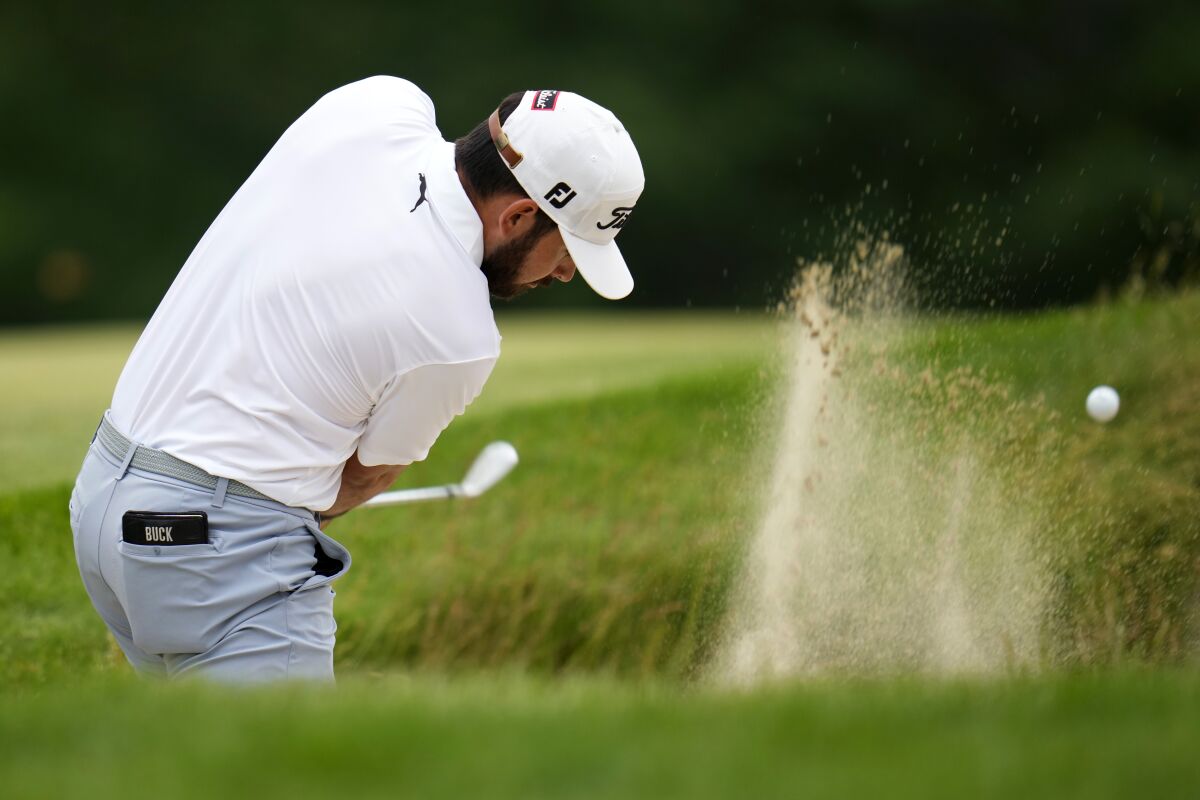 Hayden Buckley hits out of a bunker on the seventh hole during the second round of the U.S. Open on Friday.