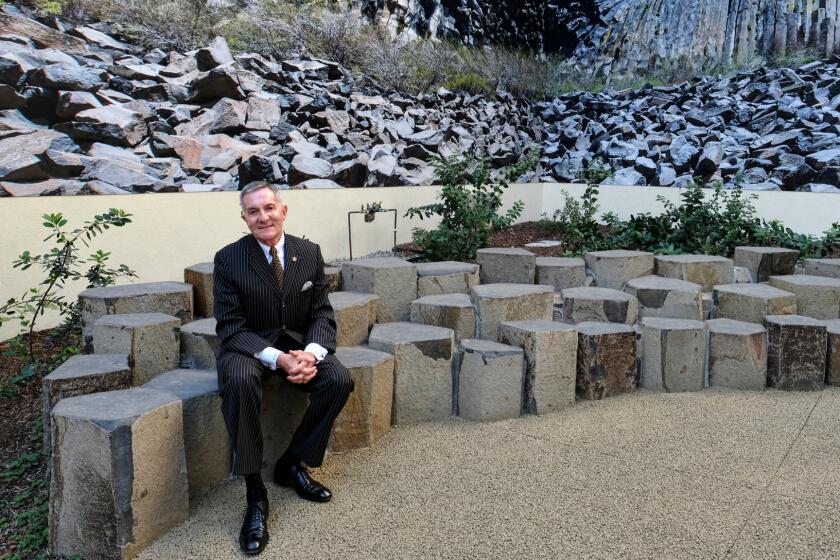 W. Richard West Jr., president of the Autry Museum of the American West, sits in one of the museum's new areas.