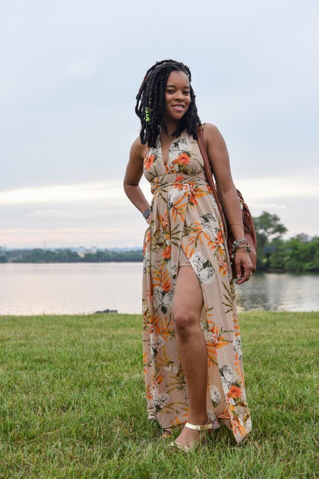 Who: Danyell Scott, 32, Pigtown resident, Sedgwick data analyst Spotted at: Jazzy Summer Nights at West Covington Park What she wore: Beige with orange, white and green floral print maxi-dress and MMS Design Studio tobacco backpack from Target; gold flat sandals from Five Below; Alex and Ani bracelets; and Apple rose gold watch. Her “free” style: “I don’t wait for trends or anybody else to tell me [when something is “in”]. If it like it, I wear it.”