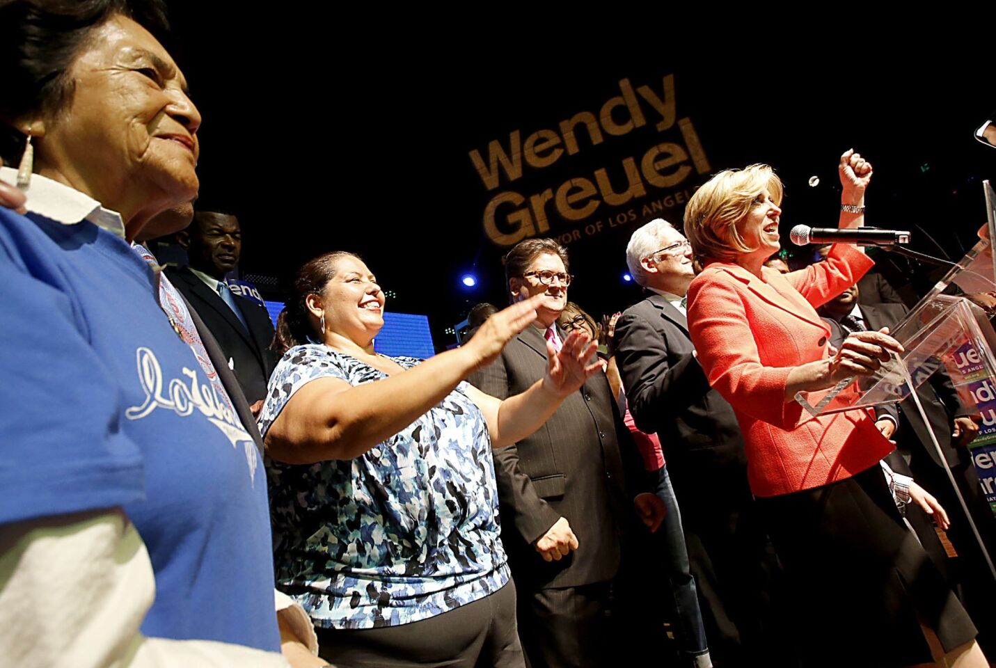 L.A. mayoral candidate Wendy Greuel and some supporters take the stage during an election night gathering at the old Pacific Stock Exchange.