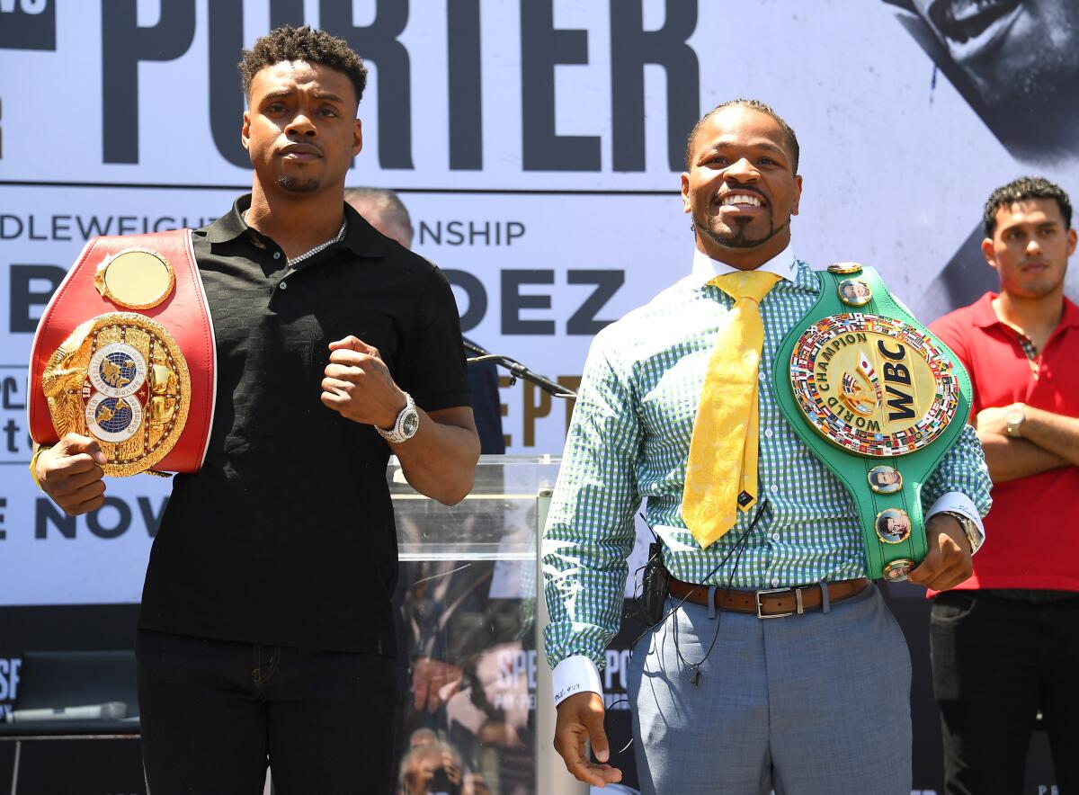 Errol Spence Jr., right, and Shawn Porter attend a news conference Aug. 13 at Staples Center. The two will face off in a welterweight contest Saturday.