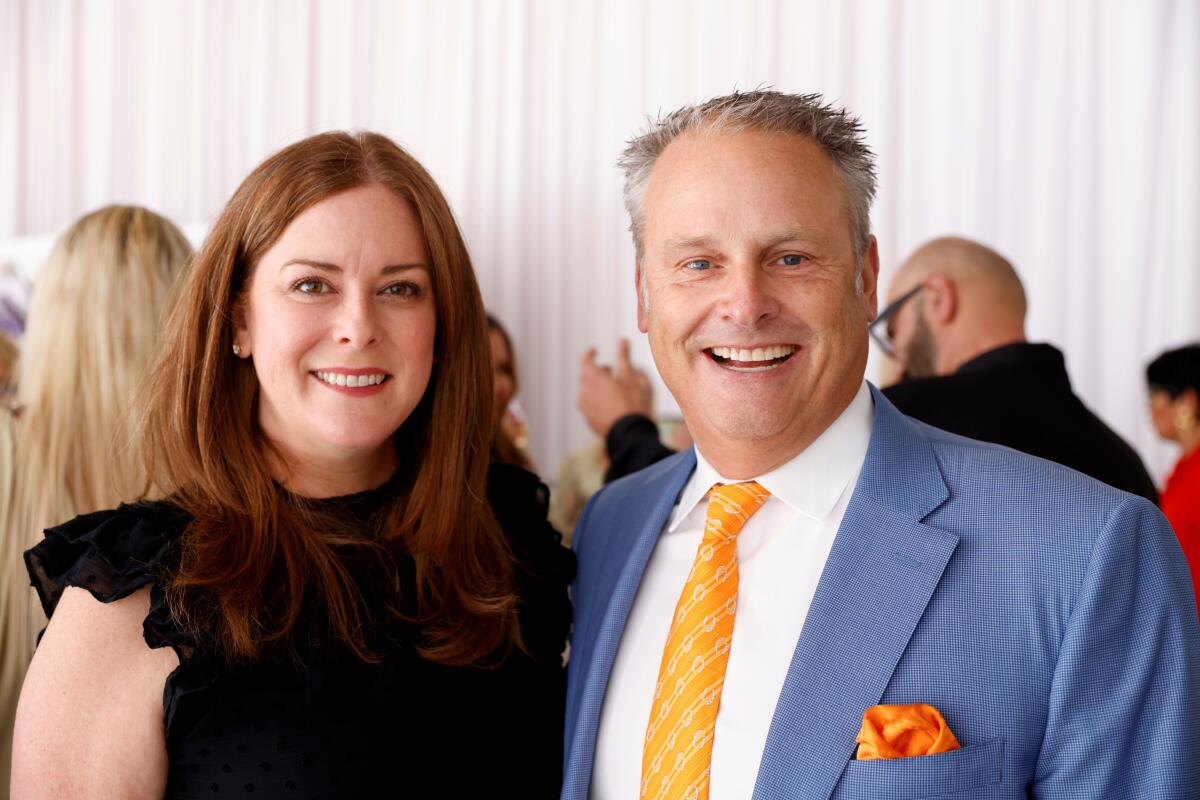 Sponsors Stephanie Rogers and David Hasenbalg at the Harvesters Fall Fashion Luncheon.