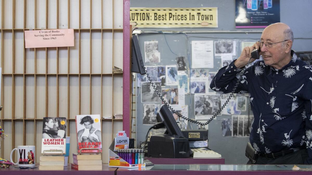 Barry Mason behind the counter of his iconic porn shop, Circus of Books, on Santa Monica Boulevard in West Hollywood.