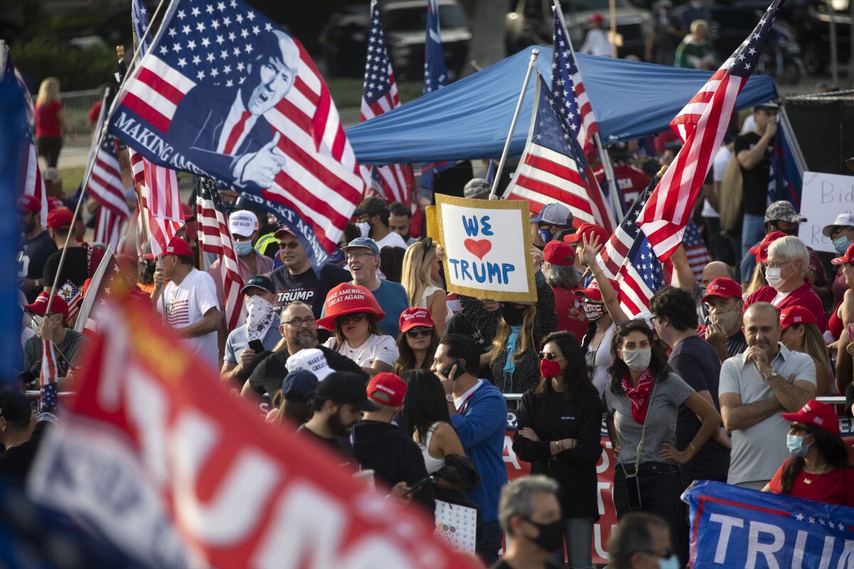 Supporters of President Trump rally in Beverly Hills on Oct. 31.