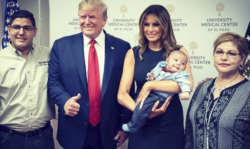 President Trump and First Lady Melania Trump with a baby orphaned in El Paso, Texas,  shooting. 