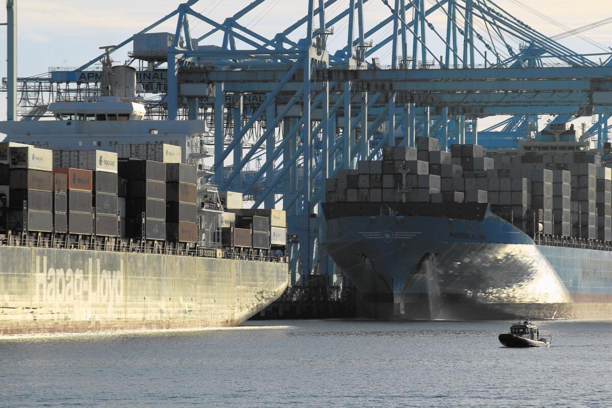 A container ship is docked at the Port of Los Angeles on Terminal Island.