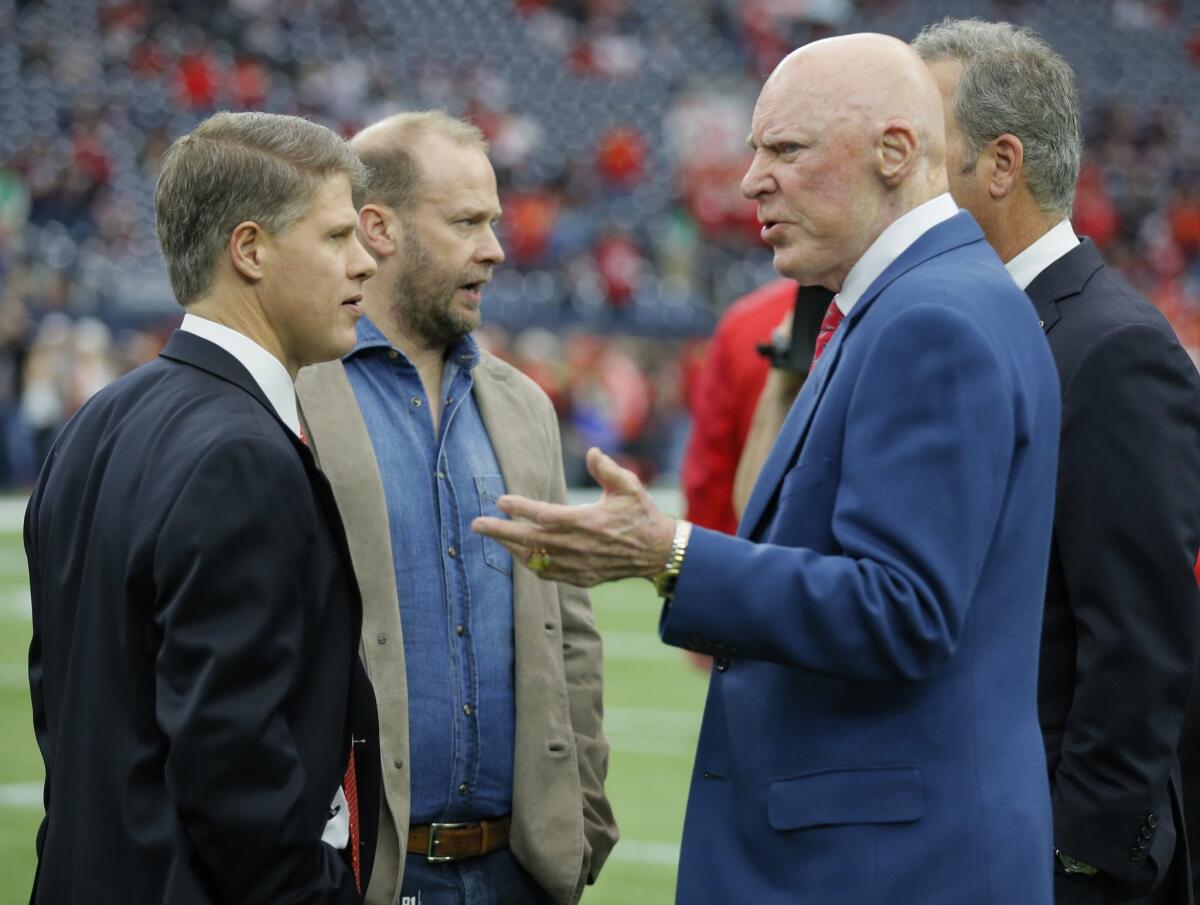 Kansas City Chiefs CEO Clark Hunt, left, and Houston Texans owner Bob McNair, right, are members of the committee.