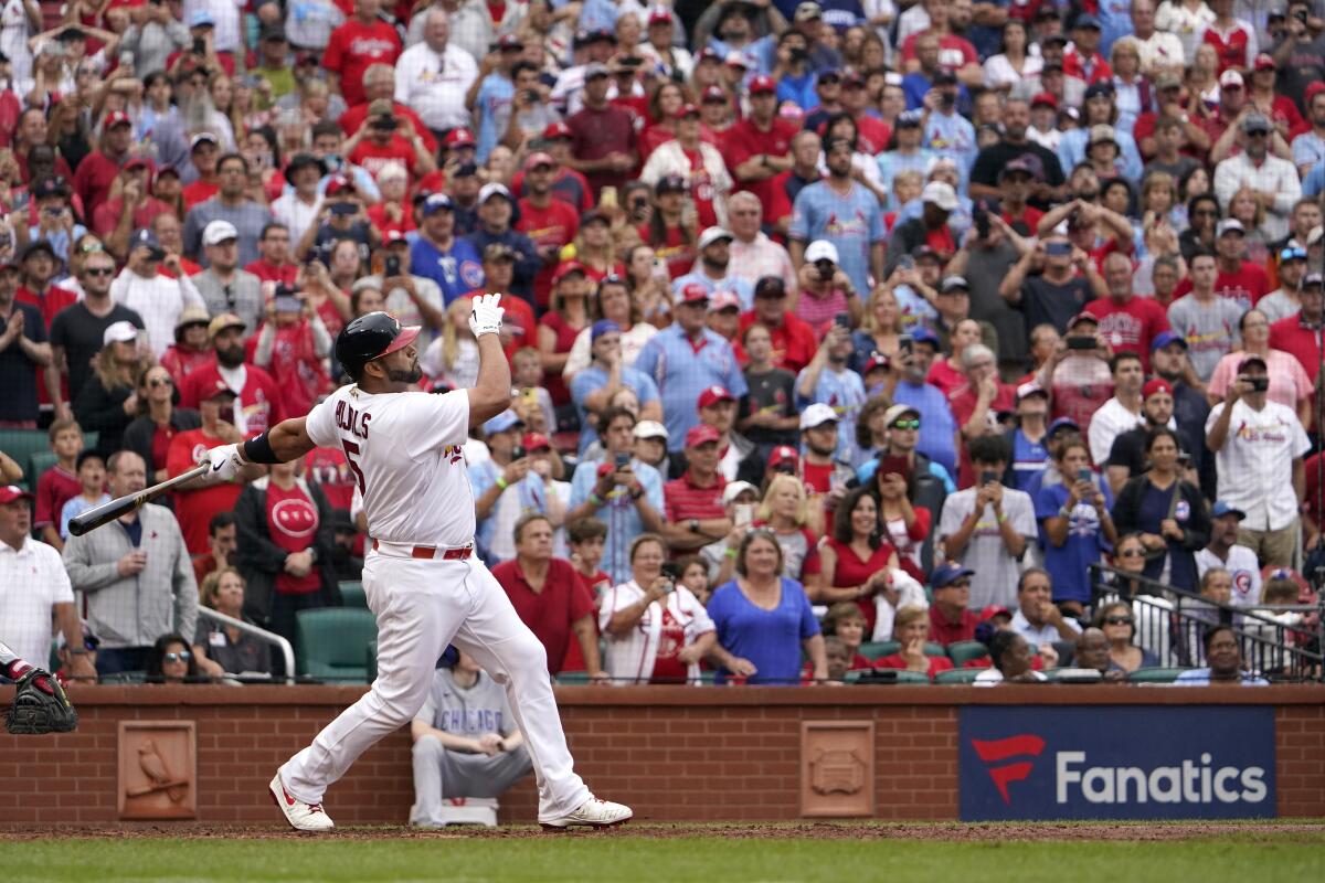 St. Louis Cardinals slugger Albert Pujols 'chases' baseball