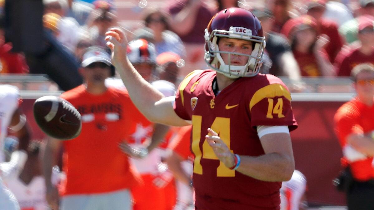 USC quarterback Sam Darnold loses his grip on the ball against Oregon State on Saturday. He had 316 yards and three touchdowns but also two turnovers against the Beavers.