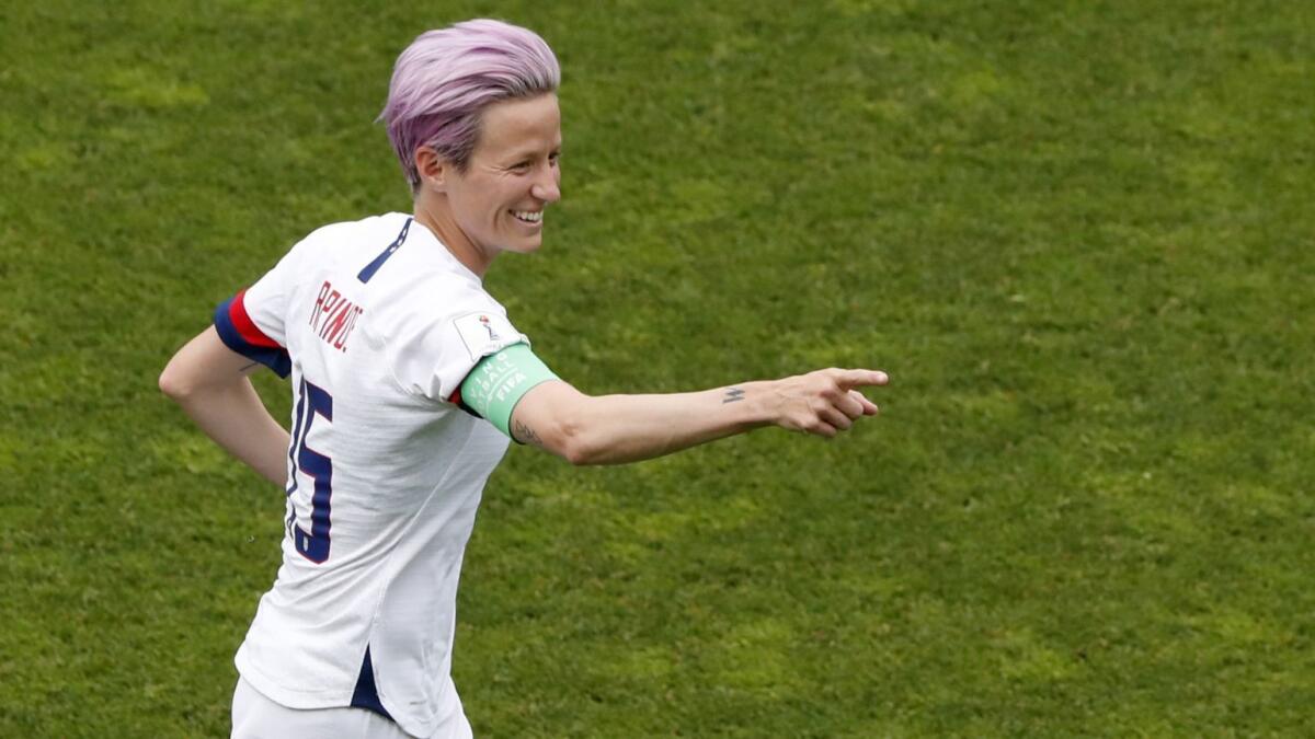 U.S. forward Megan Rapinoe celebrates after scoring on a penalty shot during the the opening minutes of a 2-1 victory over Spain in the Women's World Cup on Monday.