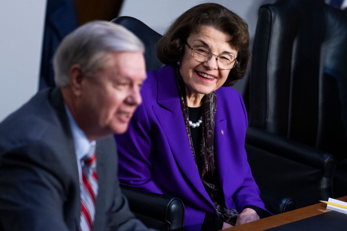 Sen. Dianne Feinstein listens to Judiciary Committee Chairman Sen. Lindsey Graham on Oct. 15.