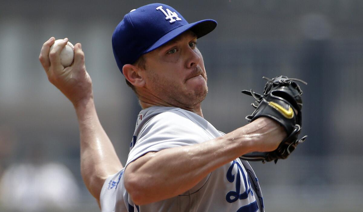 Dodgers starting pitcher Scott Kazmir delivers in the first inning against the Pittsburgh Pirates on Monday.
