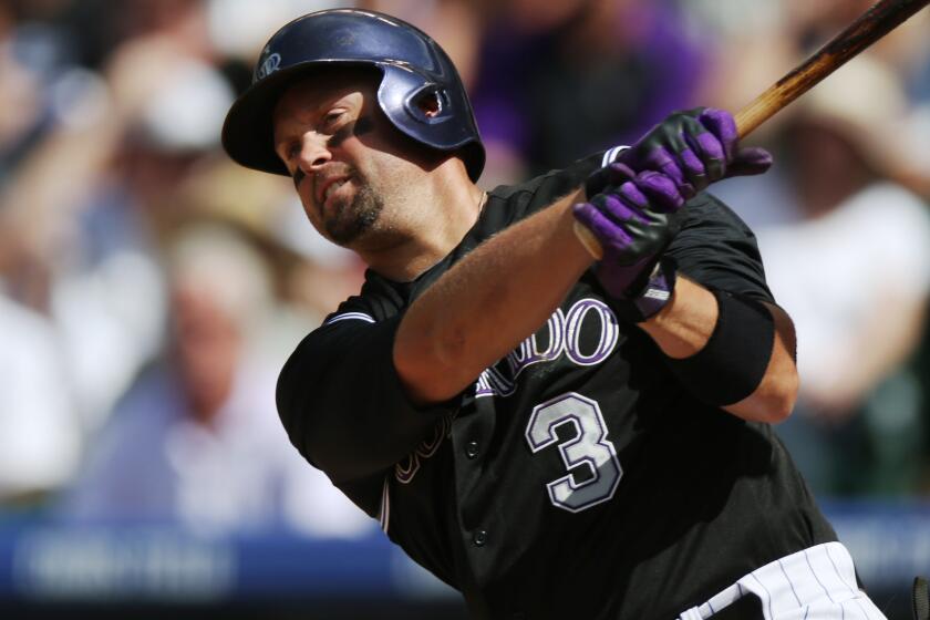 Colorado Rockies outfielder Michael Cuddyer has been placed on the disabled list because of a strained left hamstring.