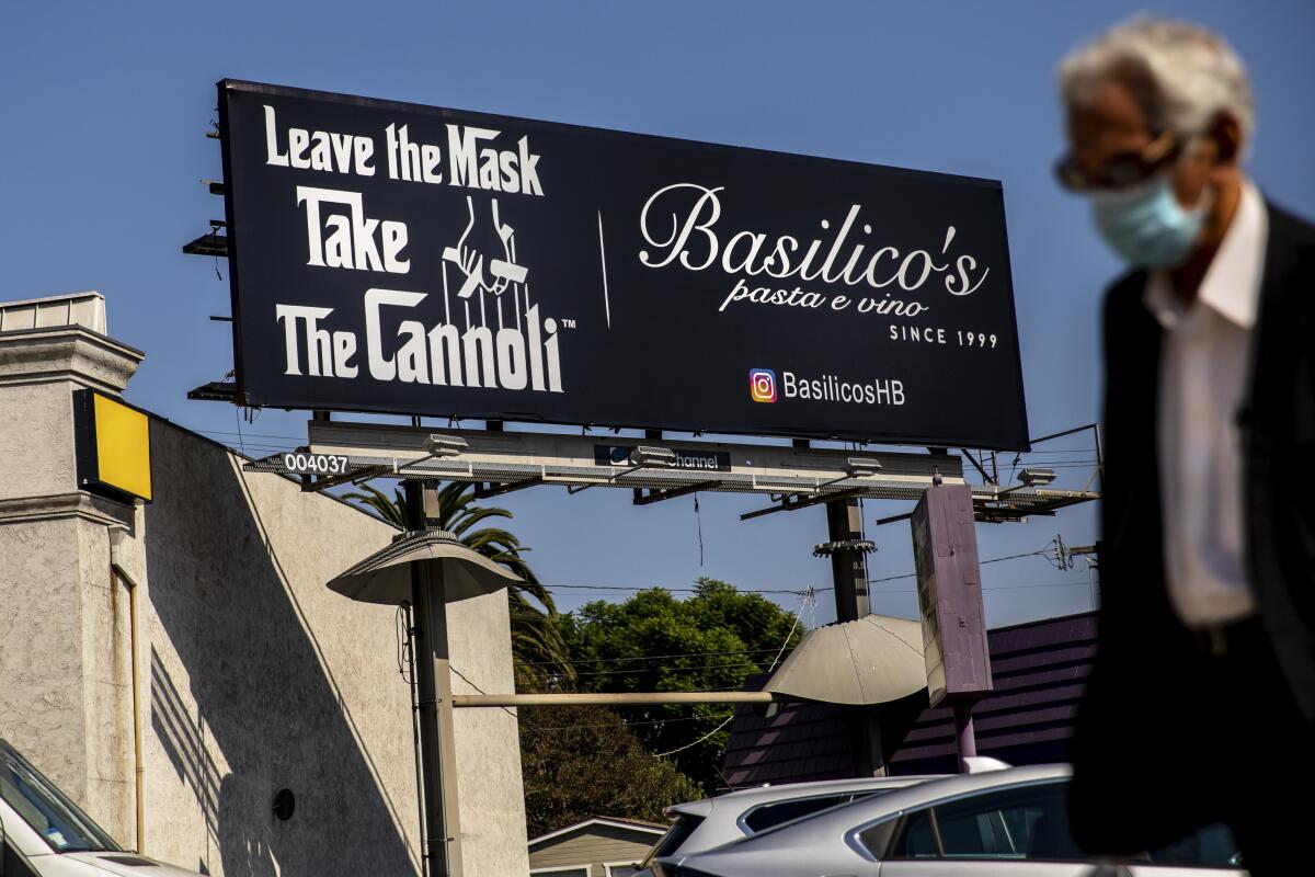 Basilico's Pasta e Vino put up an anti-mask billboard last year.