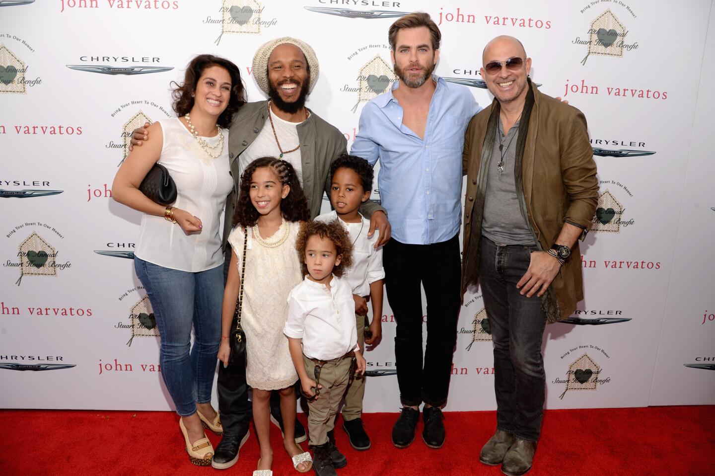 From left, Orly Marley, musician Ziggy Marley, Judah Marley, Abraham Marley, Gideon Marley, actor Chris Pine and designer John Varvatos at the 12th annual Stuart House Benefit in West Hollywood on April 26.