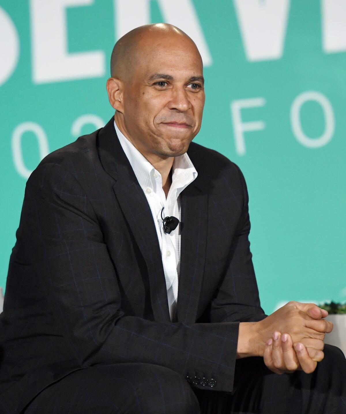  Sen. Cory Booker (D-N.J.) smiles.