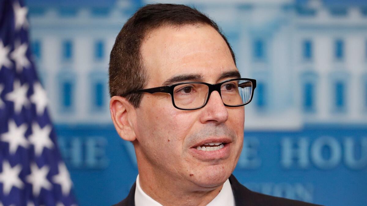 Treasury Secretary Steven Mnuchin speaks to the media at the White House on Feb. 14.