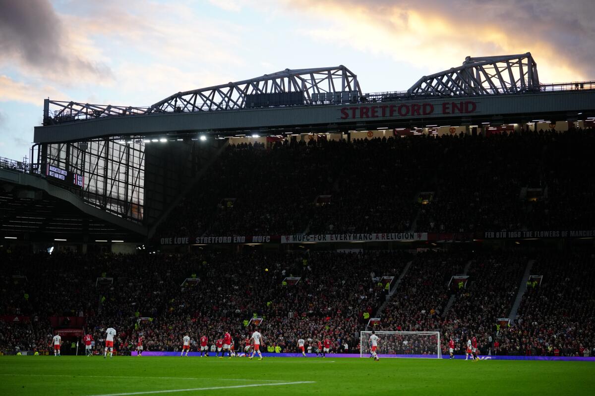 Manchester United and West Ham United players play during the English Premier League soccer match between Manchester United and West Ham United at Old Trafford stadium in Manchester, England, Sunday, Oct. 30, 2022. (AP Photo/Jon Super)