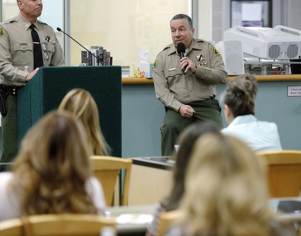 Los Angeles County Sheriff Alex Villanueva answers a question at a town hall meeting at La Cañada High School on Wednesday, Oct. 23.