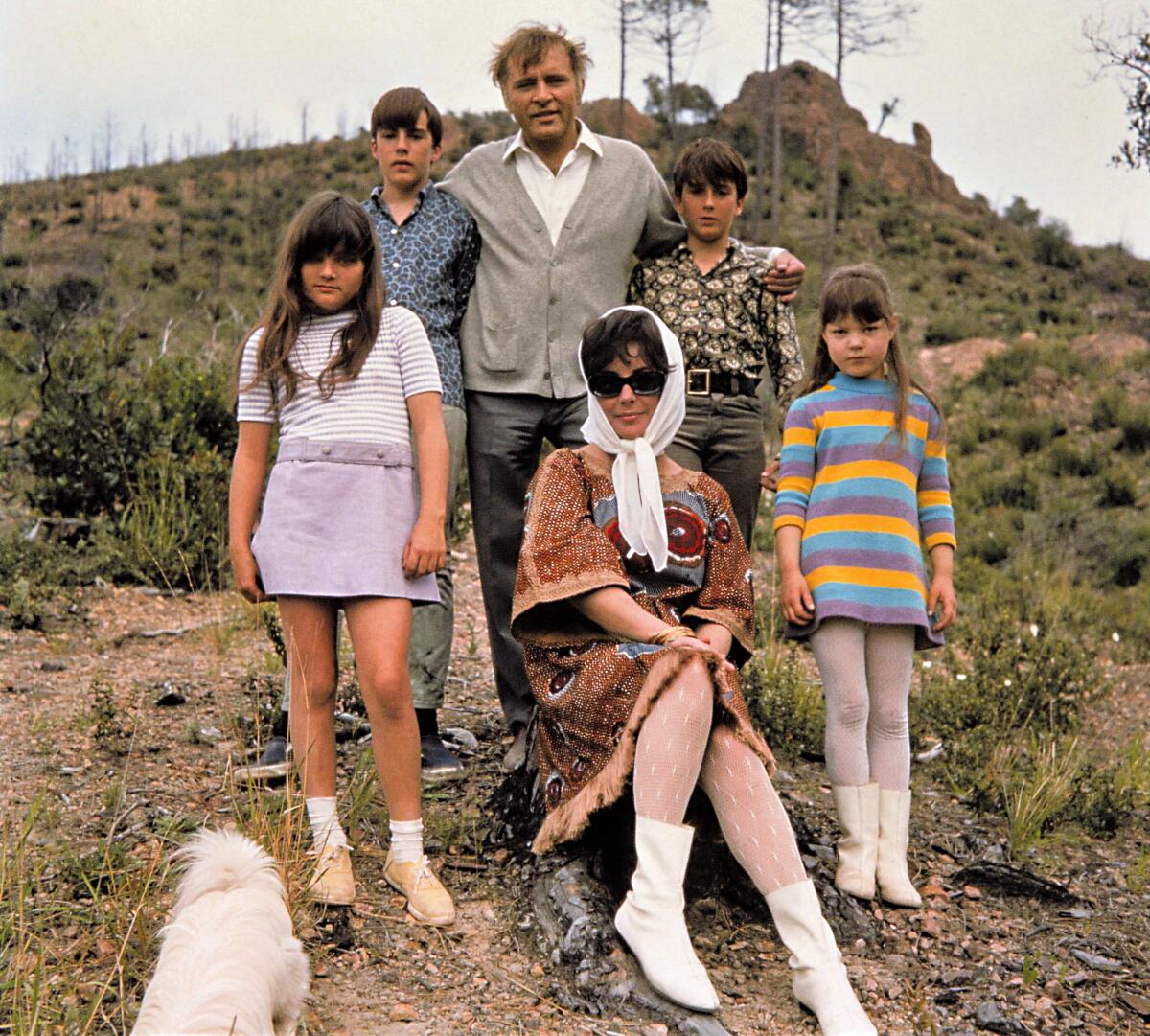 From left, Liza Todd, Michael Wilding, Richard Burton, Chris Wilding, Maria Burton, and Taylor (seated) in 1967.