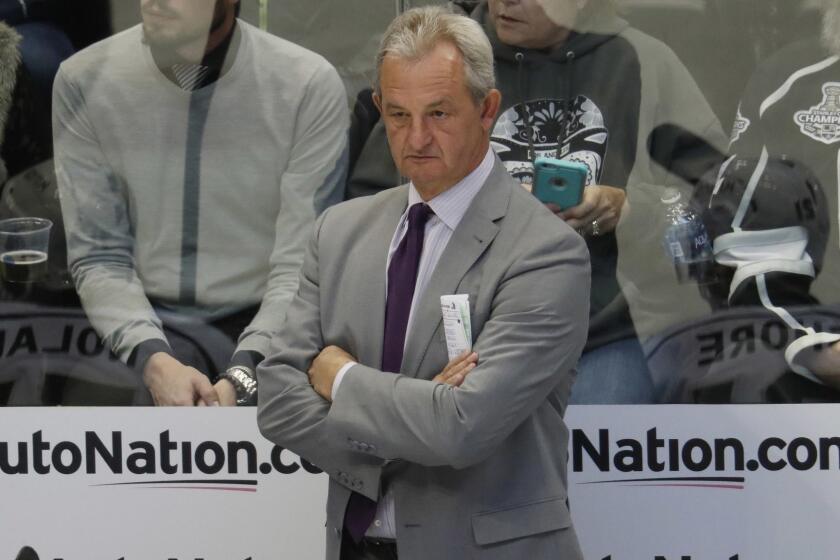 Los Angeles Kings head coach Darryl Sutter looks on against the Colorado Avalanche in the first period of an NHL hockey game Tuesday, Nov. 15, 2016, in Denver. (AP Photo/David Zalubowski)