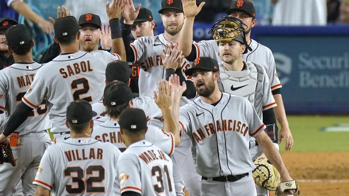 Giants' bullpen comes up big in 5-0 win over Dodgers - The San Diego  Union-Tribune