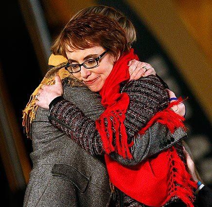 Gabrielle Giffords hugs Pam Simon