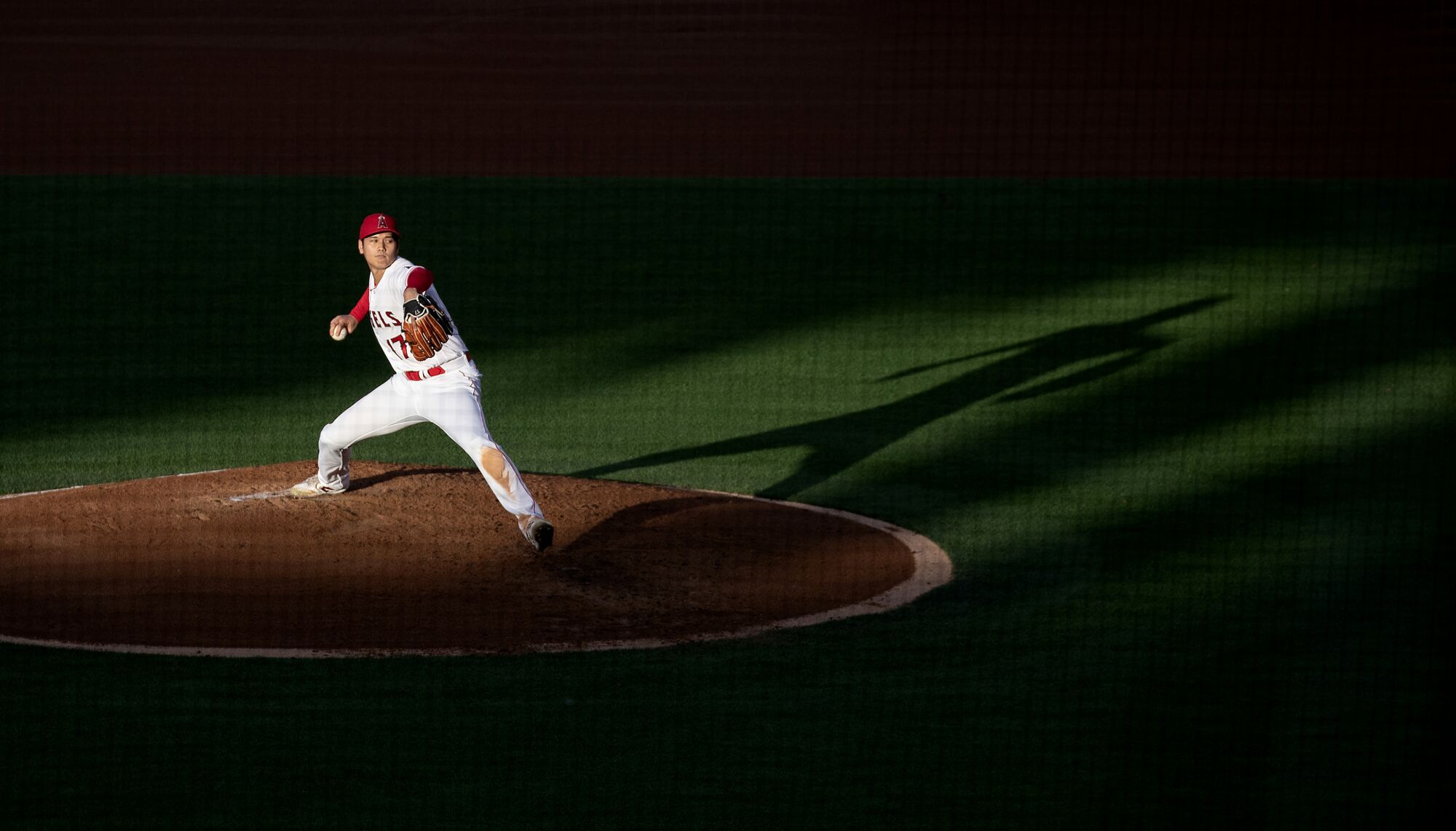 Angels starting pitcher Shohei Ohtani delivers a third-inning pitch against the Dodgers June 21 at Angel Stadium.