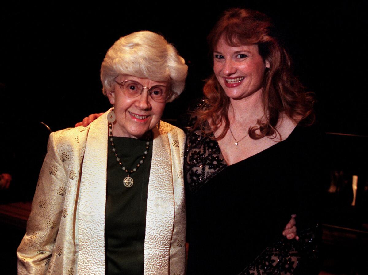 Children's book illustrator Marcia Brown, left, with Southland Opera general director Ann Noriel in 2000. Brown won the Caldecott award for her illustrations three times, and was a six-time finalist. She died April 28 at age 96.