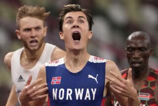Jakob Ingebrigtsen, of Norway celebrates winning the gold medal in the final.