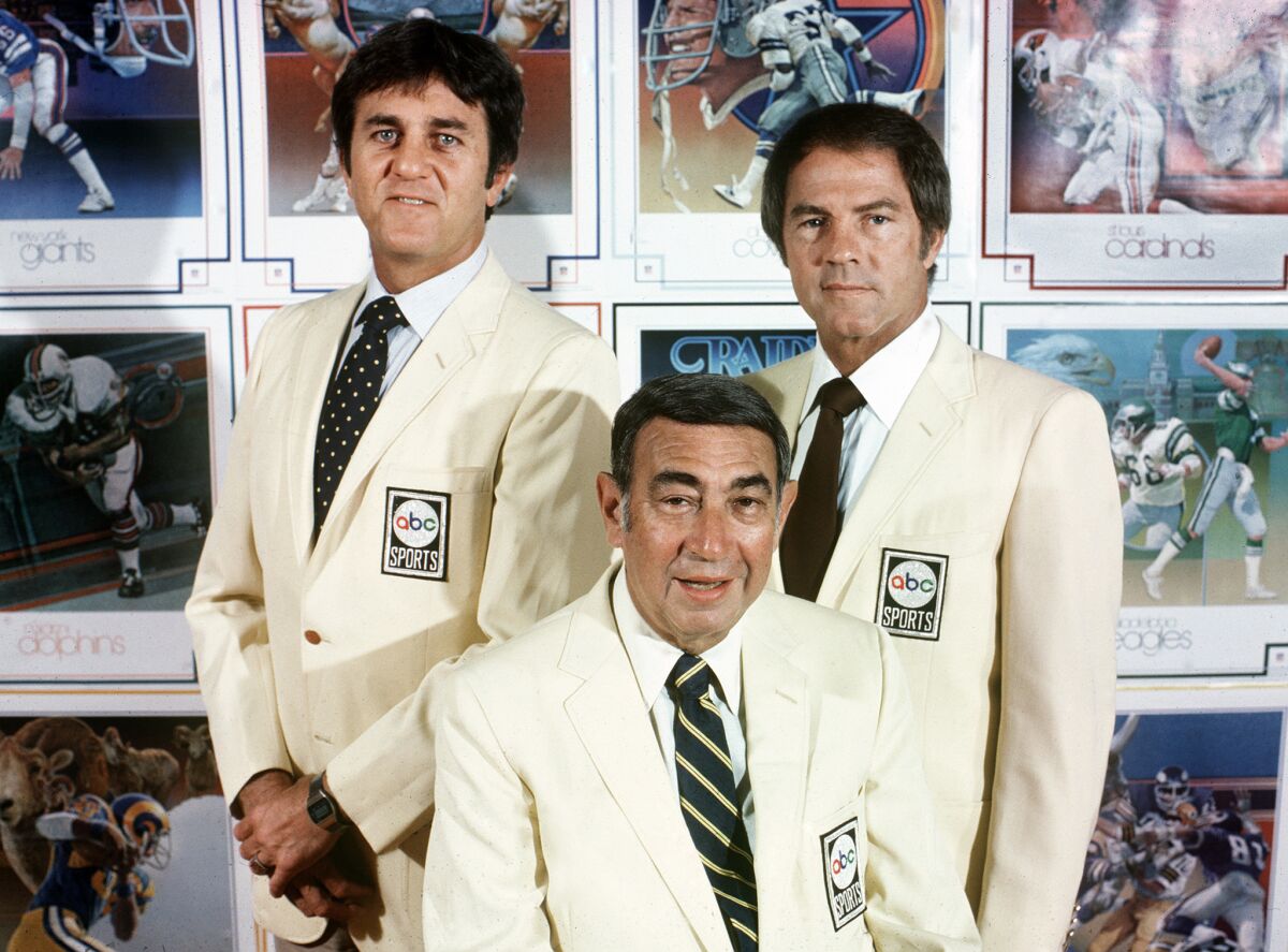 Don Meredith, Howard Cosell and Frank Gifford in 1980, wearing matching blazers with an ABC patch.