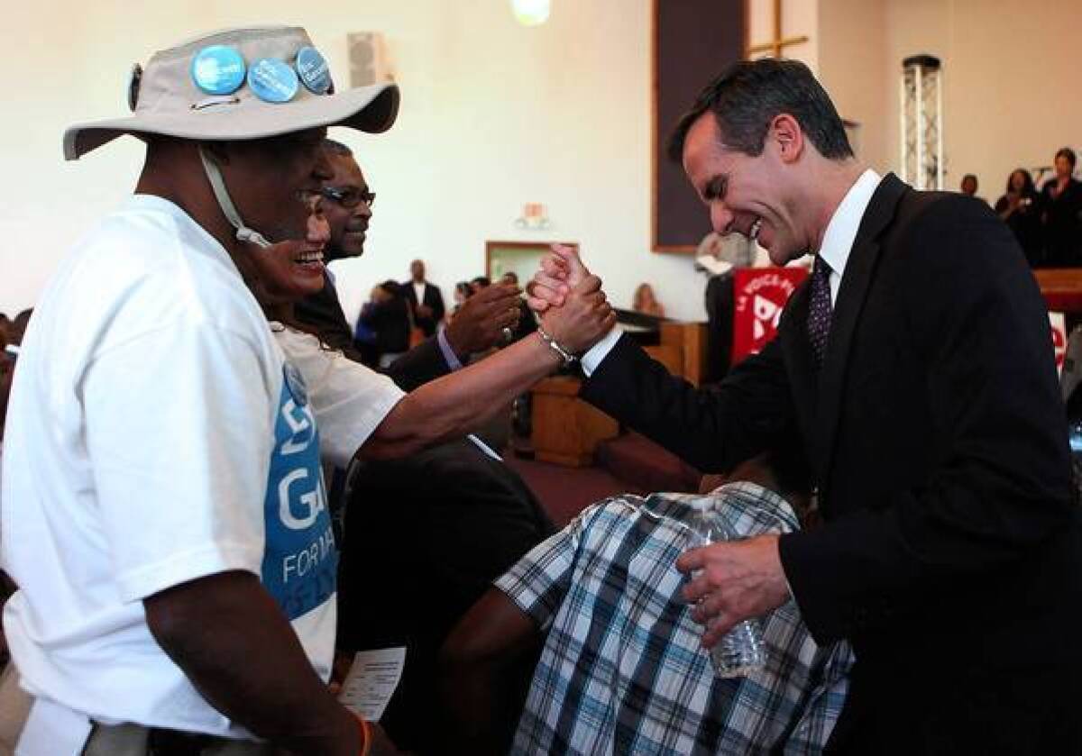 Los Angeles City Councilman Eric Garcetti greets supporters at a candidates forum at Macedonia Baptist Church on Monday.