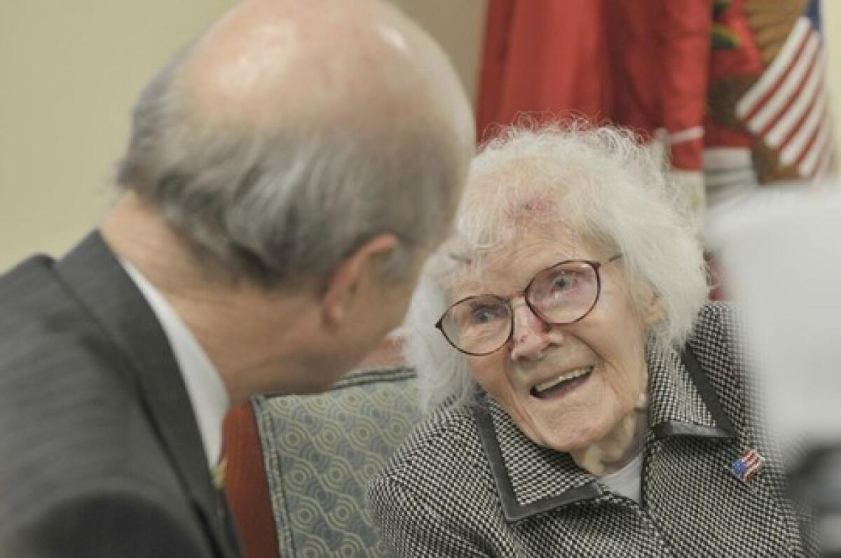 Gertrude Noone speaks with Army Secretary Pete Geren in March, when he honored her in recognition of Women's History Month and the Army's Year of the Non-Commissioned Officer.