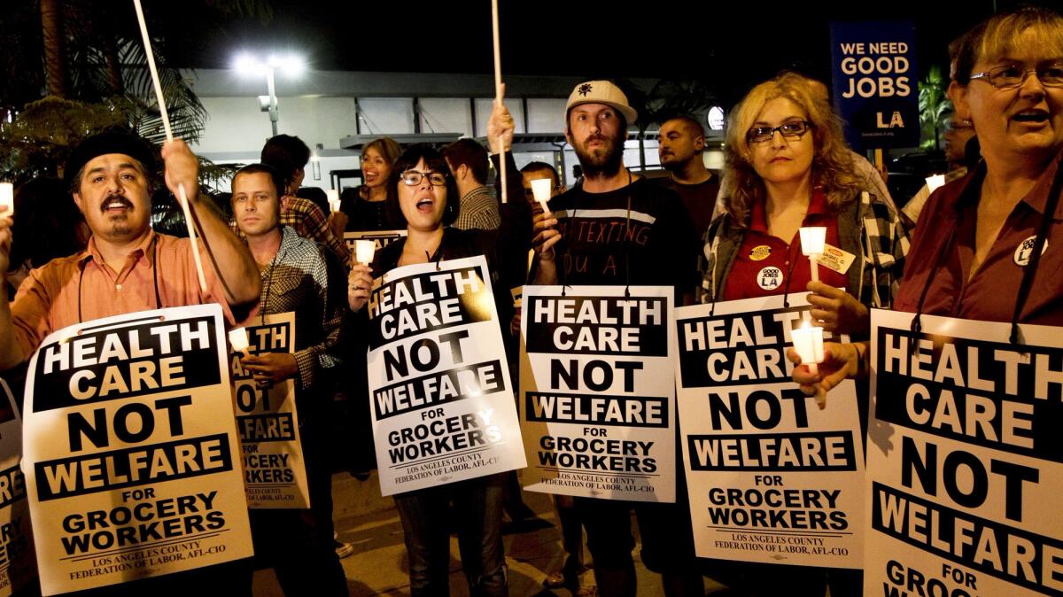 Ralphs, Vons and Albertsons employees at a 2011 vigil in Beverly Hills.