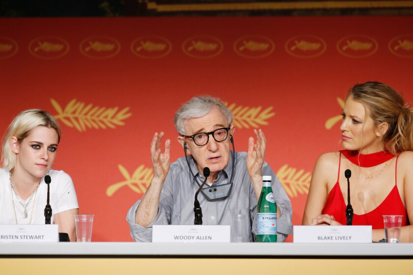 From left, Kristen Stewart, Woody Allen and Blake Lively attend the "Cafe Society" news conference during the 69th annual Cannes Film Festival on May 11, 2016, in Cannes, France.